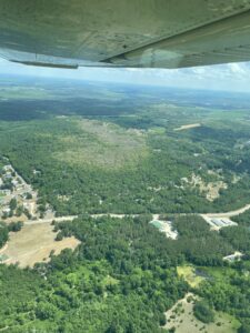Aerial photo showing heavy spongy moth defoliation areas in Columbia County.