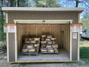 A shed inside Mirror Lake State Park offers bundles of local firewood for sale. All staffed State Parks with campgrounds offer firewood for sale.