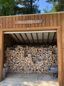 Photo showing a firewood purchasing kiosk. All staffed Wisconsin state parks and forests offer on-site firewood purchase.