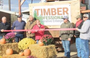 A ribbon-cutting ceremony at the reopening of a mill in Tilleda, Wisconsin.