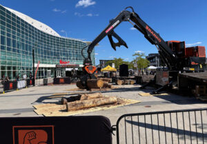 Heavy construction equipment at a site.
